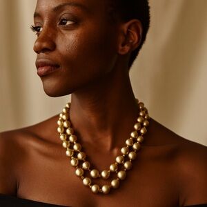 Elegant Gold and Cream Beaded Necklace